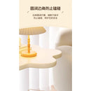 A few cream windblown hair and a few small coffee tables in the living room, a small dining table in the home, a small apartment